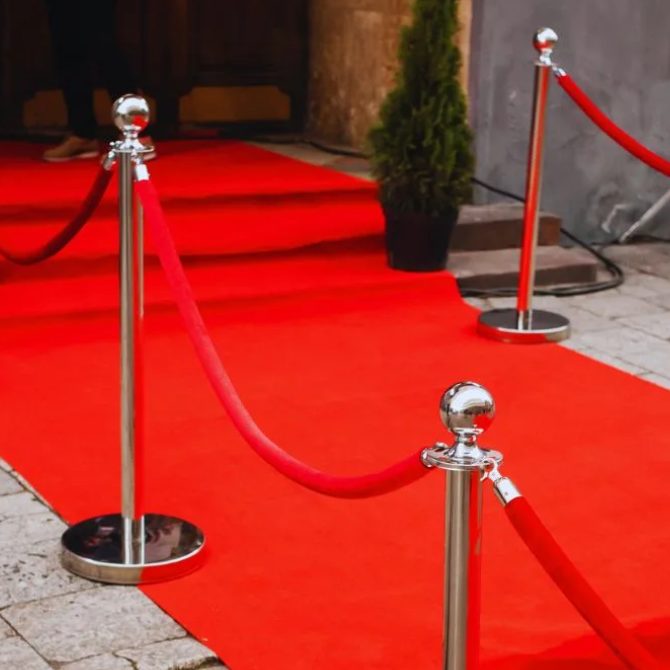 Glam Lane stanchions lining a red-carpet event entrance